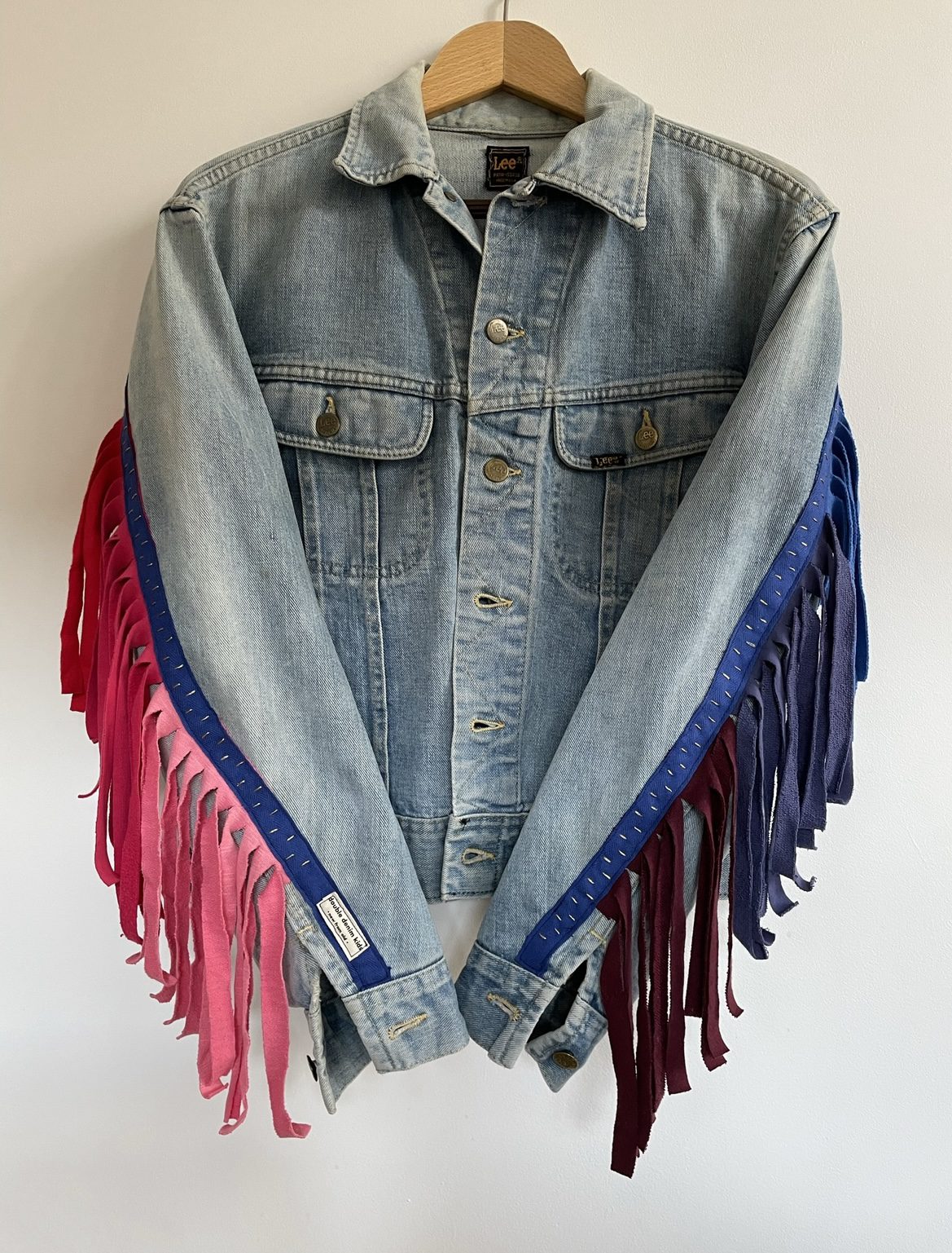 Vintage denim jacket with recycled rainbow tassels