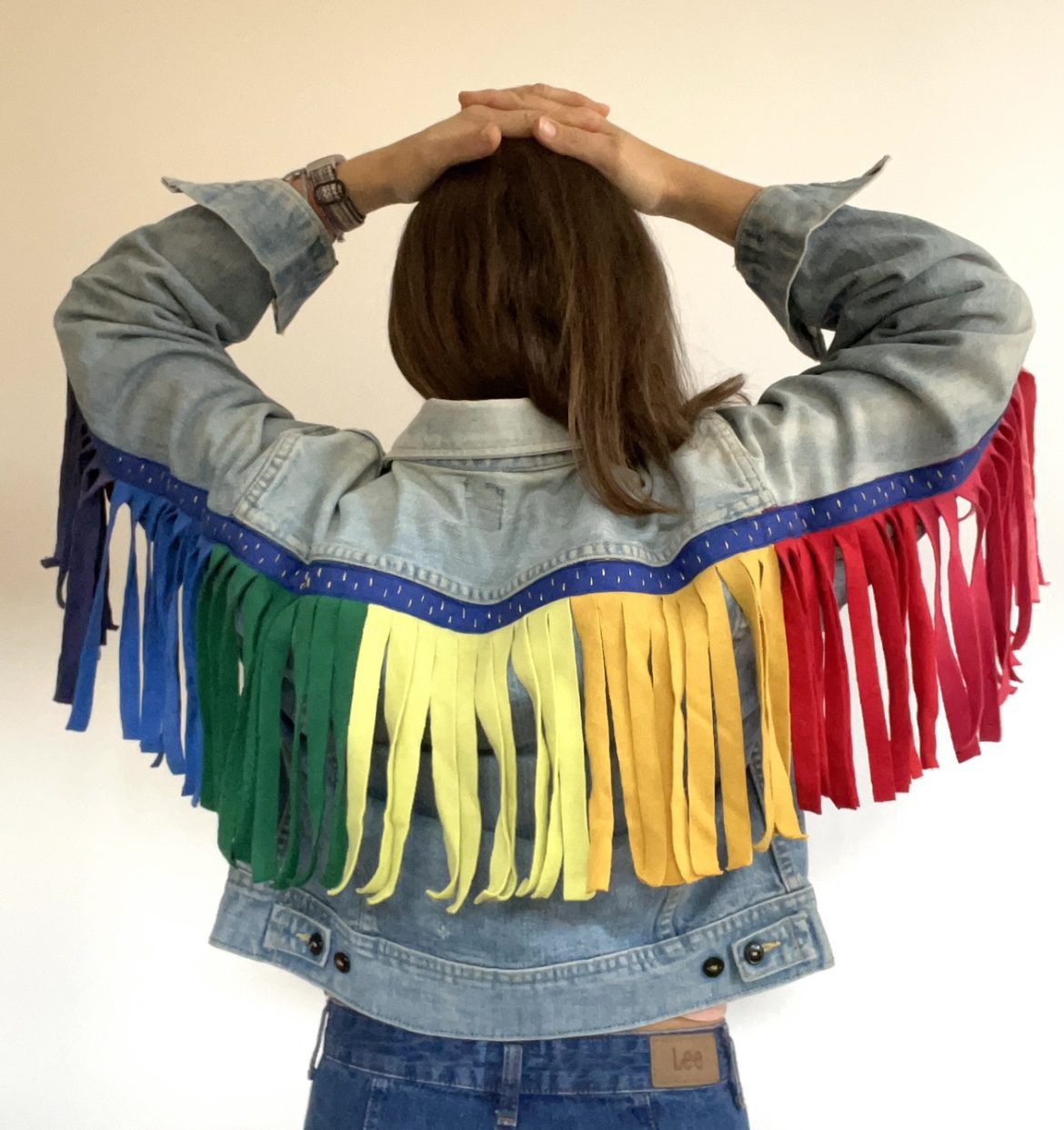 Vintage denim jacket with recycled rainbow tassels