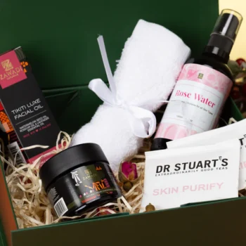 Spoil Her Self Love Gift Box featuring Makeda Glow Pot, Tikiti Luxe facial oil, a bamboo face towel, skin teas and natural skincare treats beautifully arranged in a box