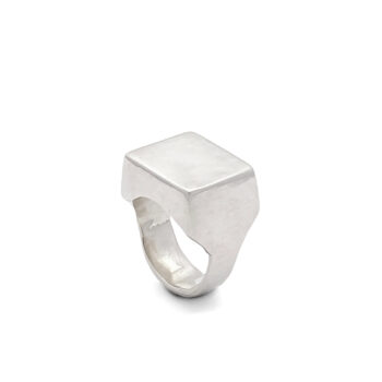 Single sterling silver square signet ring displayed on a white background