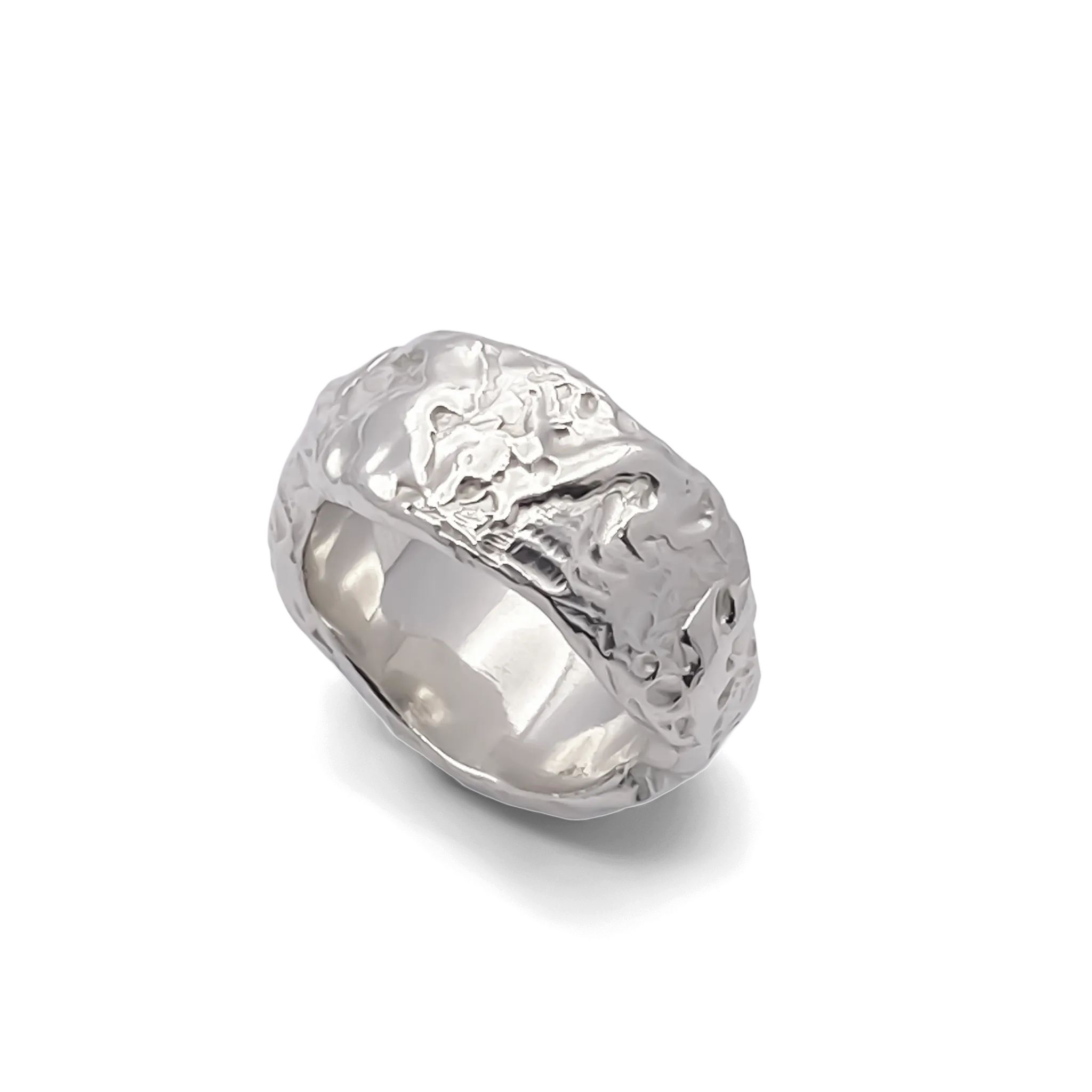 Angled view of textured silver ring with uneven shape