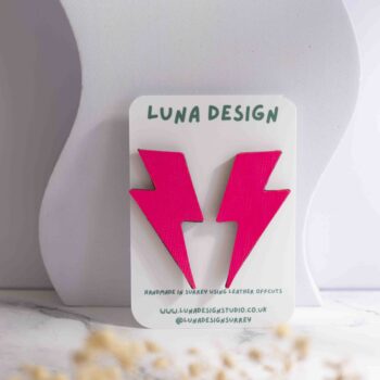 Extra-large neon pink lightning bolt stud earrings