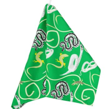 Bright green tea towel with snakes and lizards design shown hanging from hanging loop on a white background