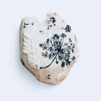 Beating through -hand crafted porcelain heart